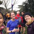 Flo, Ashleigh and Morgan outdoors in the park at a running event