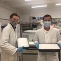 Brett and Dave in the lab holding trays with ice, getting ready to undertake the RNA interactome capture protocol