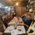 Picture of members of the lab having dinner in a restaurant